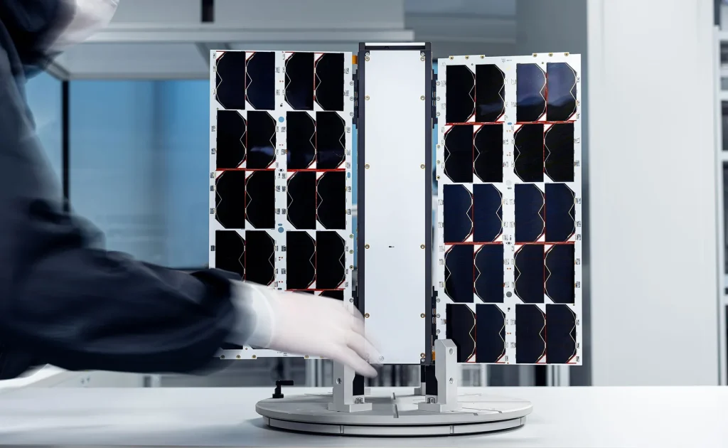 EnduroSat 8u cubesat standing on test platform with integrated solar panels