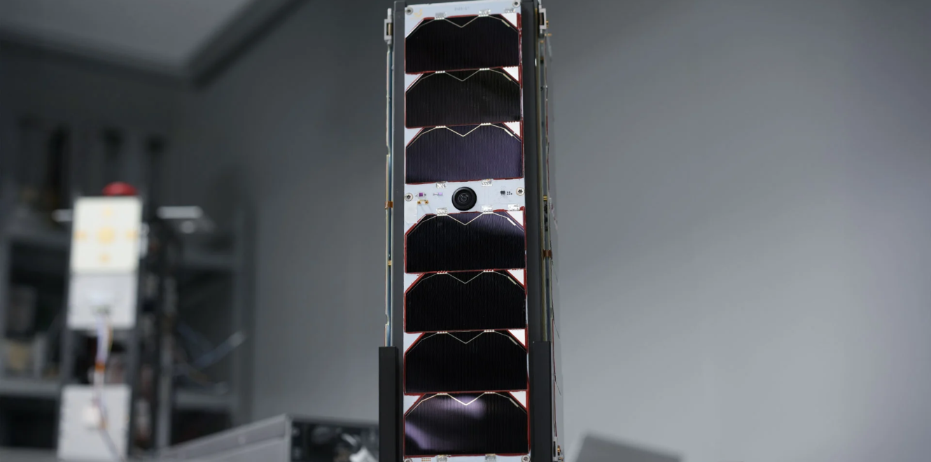 Front view of undeployed 3U Deployable Solar Panel placed on a lab table